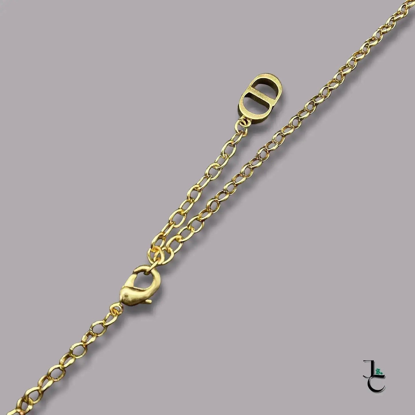 Delilah & Co Gold Flower Logo Chain - Jade St. Clair - Jade St. Clair